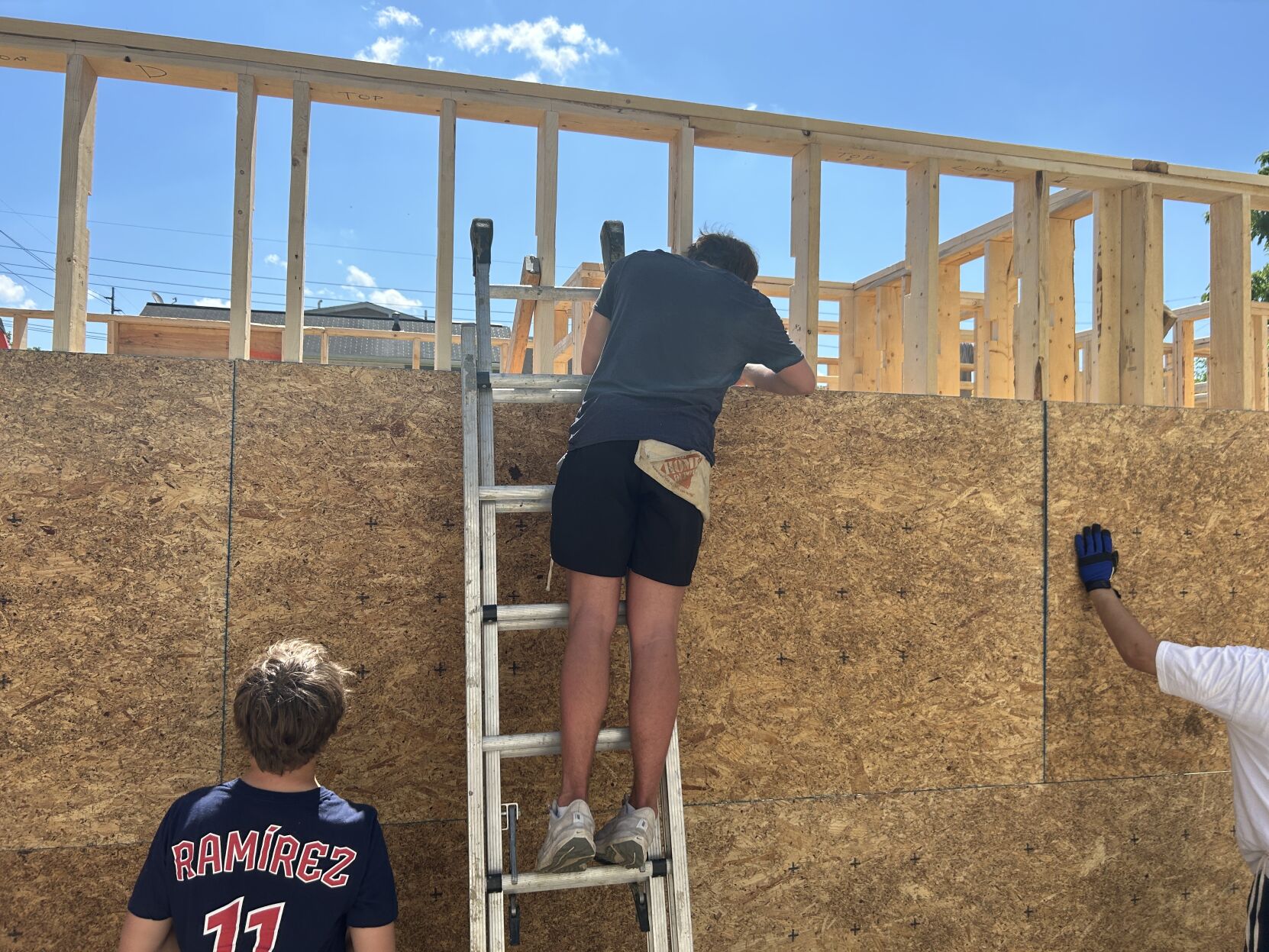 Holy high five builds house